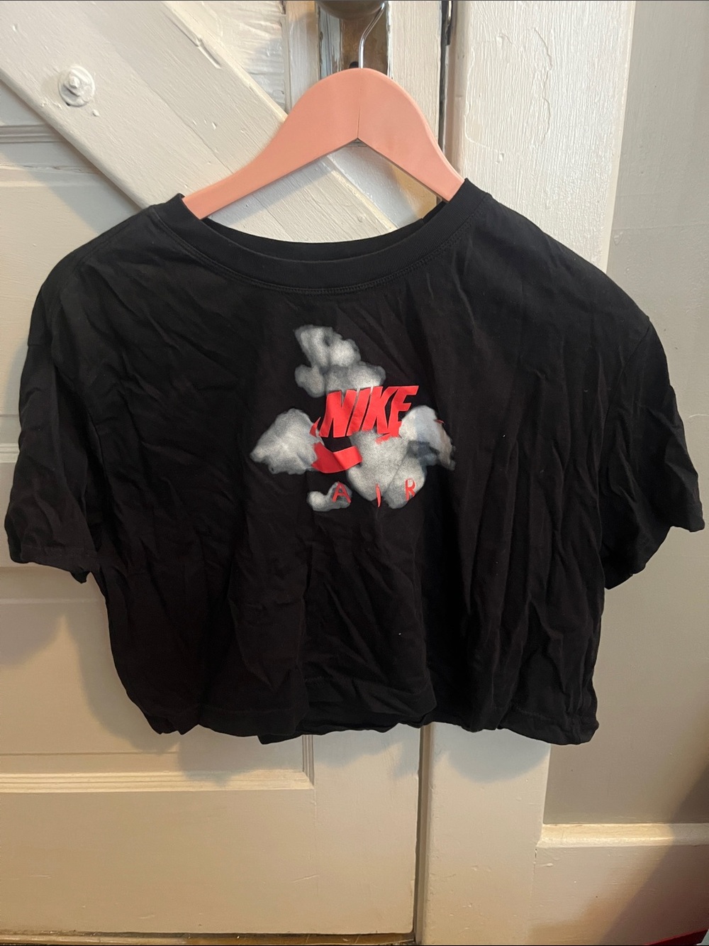 Nike Black Cropped Tee with Red Logo and White Cloud Graphic